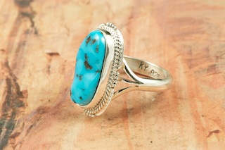 Sleeping Beauty Turquoise set in Sterling Silver Ring. The Sleeping Beauty Turquoise mine is located in Gila County, Arizona. Created by Navajo Artist Kathy Yazzie. Signed by the artist.